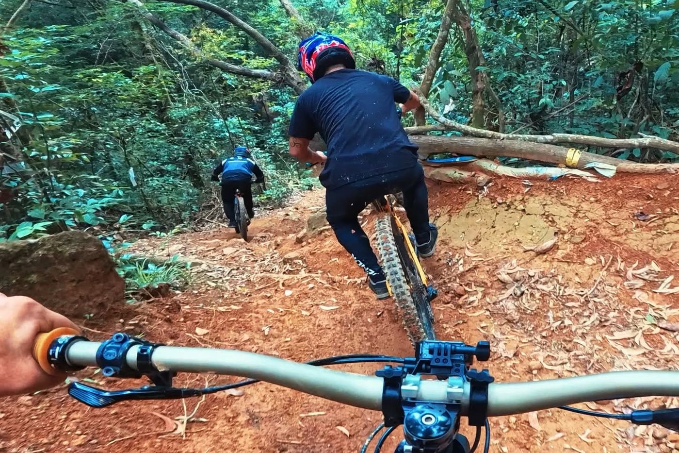 Following two riders down a loamy section of Teban Trail
